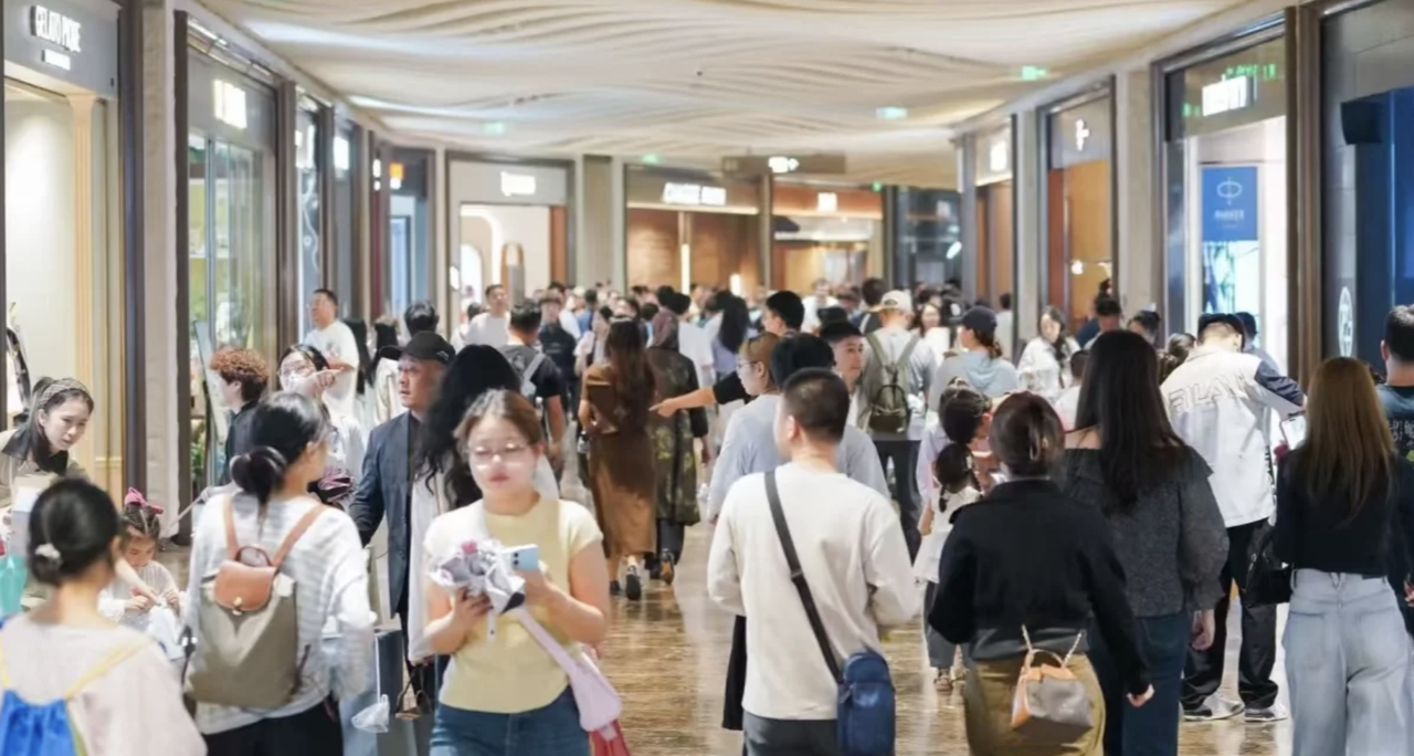 Chinese consumers in a busy shopping mall
